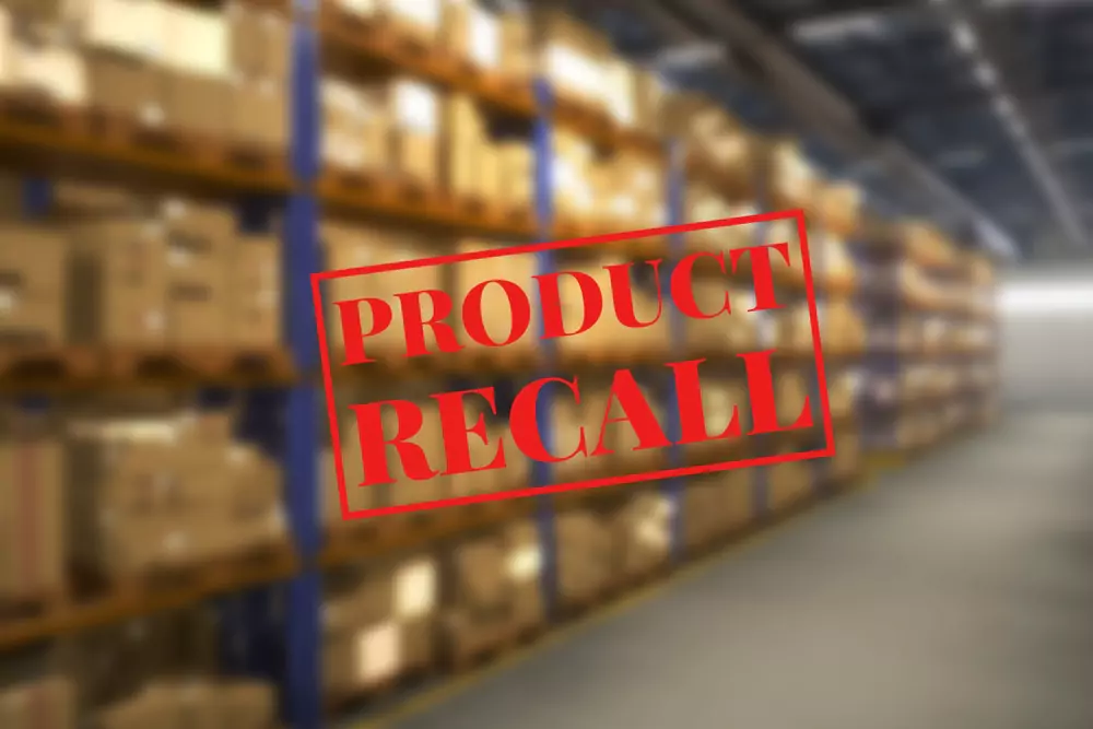warehouse shelving with product recall written on top