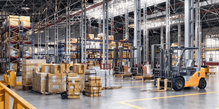 forklift and pallets of inventory in warehouse