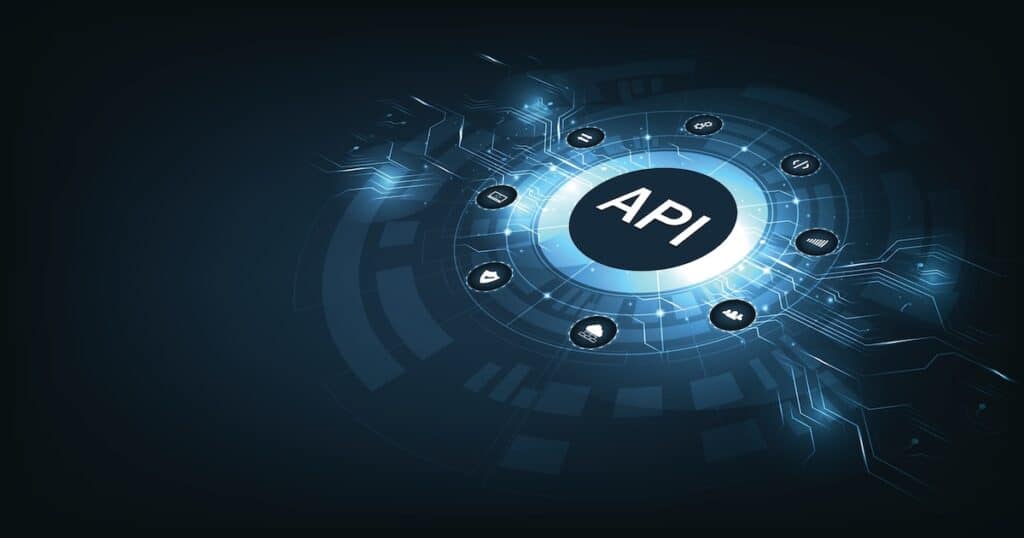 API in a circle surrounded by process icons representing connecting systems