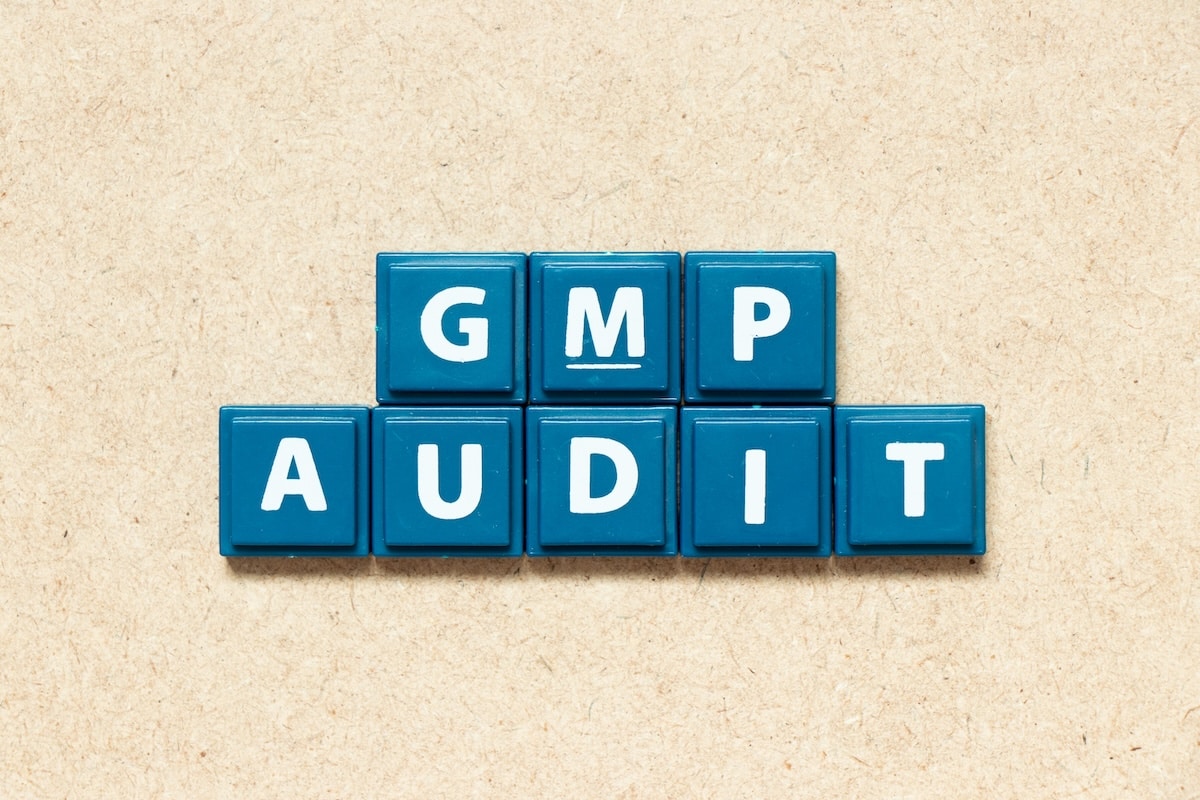 letters spelling gmp good manufacturing practices audit