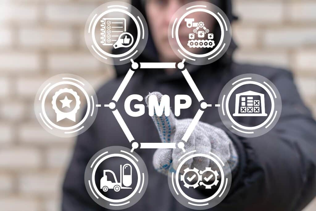 worker touching gmp good manufacturing practices graphic