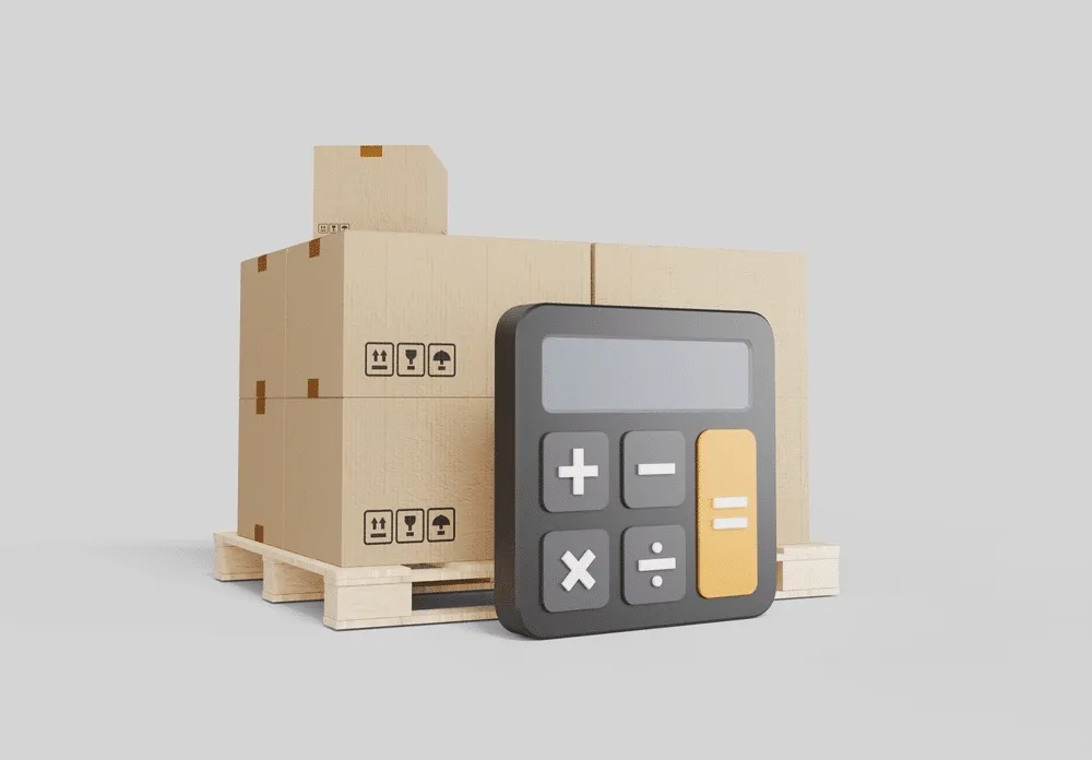 a calculator in front of a pallet of boxes